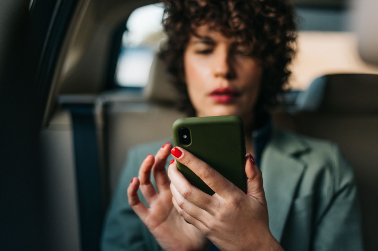 Woman holding mobile phone