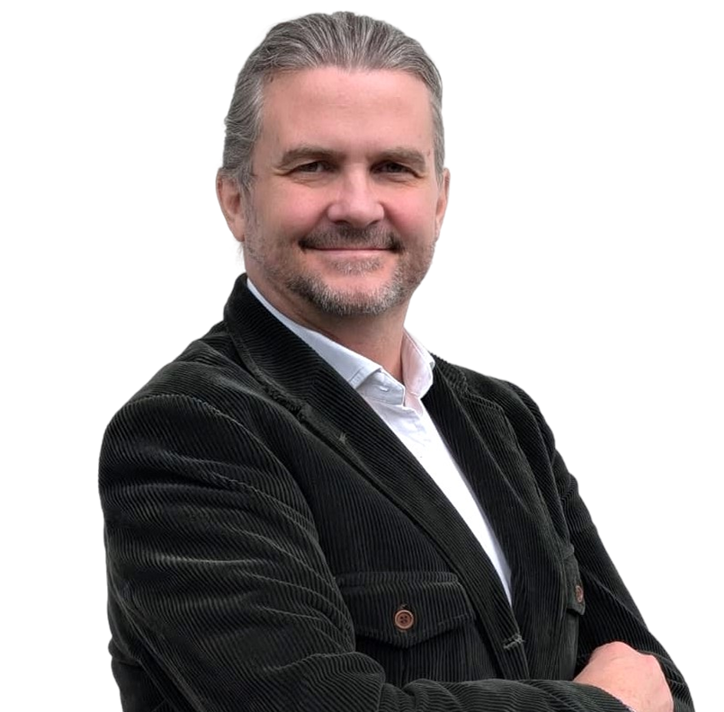 Professional portrait of William Townsend in business attire against a neutral background.